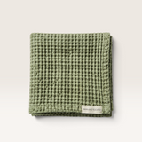 House of Holabox Mama and Tochter light olive organic cotton waffle tea towel with a soft stone washed texture.
