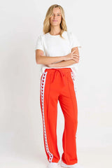 Jamie Jogger in bright red featuring a white side stripe with heart patterns and a comfortable elastic waistband.