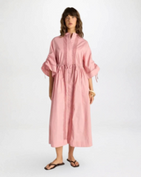 Model wearing House of Holabox Etta dusty rose cotton maxi dress with lace details and adjustable drawstring waist.