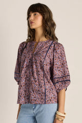 Alaia Print Lace Insert Blouse in a floral cotton fabric with voluminous sleeves and delicate pintuck detailing.