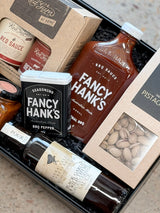 Father's Day Grill King BBQ gift box with sauces, rubs, seasonings, and pistachios