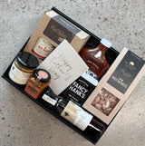 Father's Day Grill King BBQ gift box with sauces, rubs, seasonings, and pistachios in keepsake Holabox