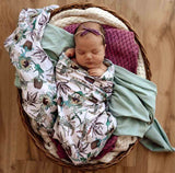 'Snuggle Hunny’ Organic Muslin Wraps
Light weight, breathable and easy to use. They are super soft and gentle on baby’s skin.  
A simple and beautiful way to swaddle your baby. This would make the perfSnuggle Hunny Kids