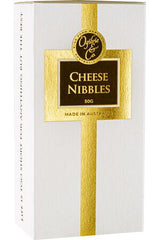 Box of Cheese Nibbles with gold ribbon and text on a white background