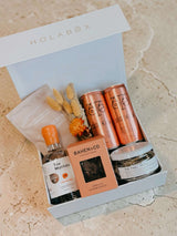 The Gin Mother Mother's Day gift box with gin, tonic waters, lime, body scrub, and chocolate nougat