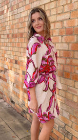 Novara Linen Dress in exclusive print with button-through front, removable waist tie, and side pockets