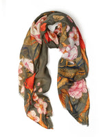 Anna Japanese Botanical scarf in moss green with a vibrant red floral print and frayed edges.