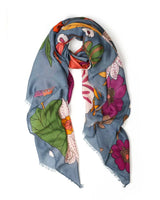 Bella Botanical in Blue scarf featuring a bold, colourful floral print on a rich blue polyester blend fabric.