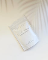 Salt Glow Shimmer Scrub packaging on a white background