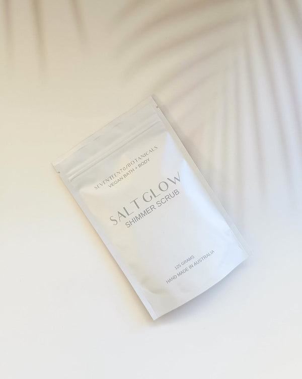 Salt Glow Shimmer Scrub packaging on a white background