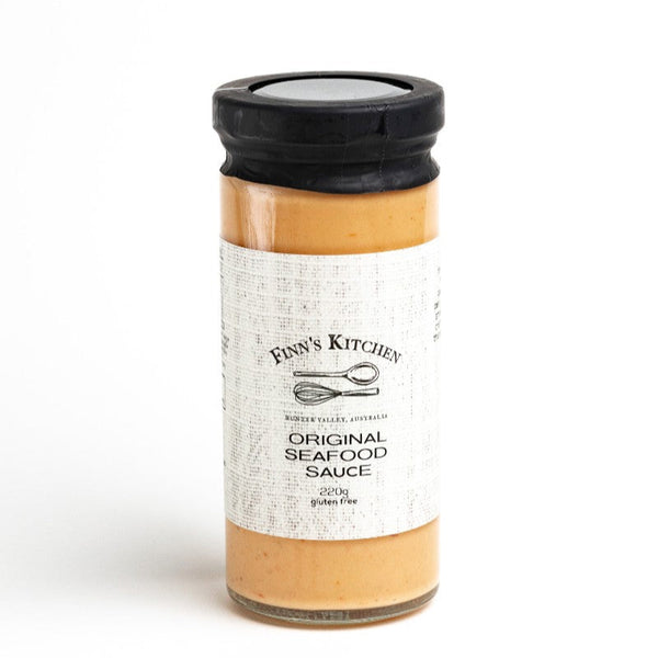Jar of Fanny's Kitchen Original Seafood Seasoning on a white background