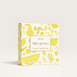 House of Holabox Stray Willow Silk Lip Duo in Mango Sorbet featuring a yellow fruit-patterned box for lip care.