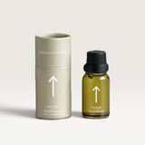 House of Holabox Addition Studio Upper essential oil blend in a 15ml amber glass bottle with a matching beige tube.