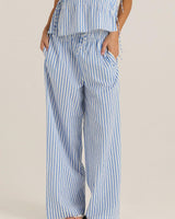 Blue and white striped seersucker wide-leg pants with an elasticated waistband and self-tie detail.