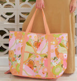 Assorted Jumbo Beach Bags with vibrant prints, waterproof and lightweight with shoulder straps and inside pocket