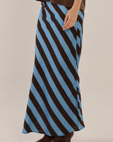 Bec bias skirt in a structured blue and brown diagonal stripe pattern with a comfortable elasticated waistband.