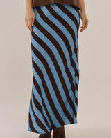 Bec bias midi skirt in blue and brown diagonal stripes with an elasticated waistband and side pockets.