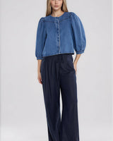 Navy tailored trousers in a viscose-linen blend featuring a relaxed fit, waist darts, and a subtle tie-waist detail.