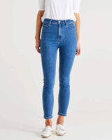 Mid-high rise blue skinny jeans with a button fly and ankle-length hem in a soft cotton-blend denim.