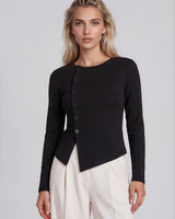 Black long-sleeve cotton-blend top with an asymmetrical button-down front and a fitted silhouette.