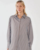 Relaxed-fit Claudia stripe shirt in brown and blue with a concealed placket, dropped shoulders, and wide cuffs.