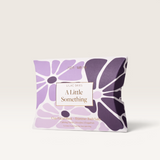 House of Holabox Stray Willow Lilac Skies self-care gift set featuring a purple floral patterned box