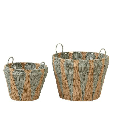 Two woven baskets with geometric patterns on a white background