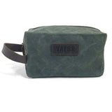 Green 'Valor' waxed canvas toiletry bag with leather trim and branded logo.
