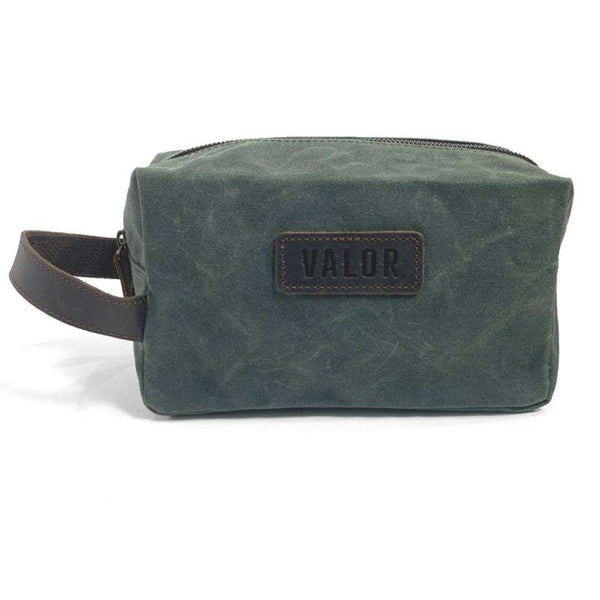 Green 'Valor' waxed canvas toiletry bag with leather trim and branded logo.