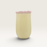 House of Holabox Ecology Tousle Picket Vase in citrus yellow soda-lime glass with a unique sculptural silhouette.