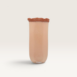House of Holabox Ecology Tousle Picket Vase in Dawn, a handmade peachy-pink soda-lime glass vase with a ruffled rim.