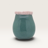 House of Holabox Ecology Tousle Picket Vase in meadow green glass with a handcrafted ruffled pink rim