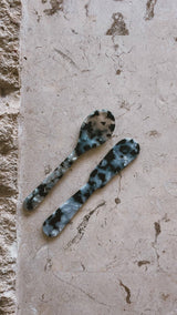 Saltist acrylic spoon and butter knife set in a blue and black marbled pattern, perfect for grazing boards.