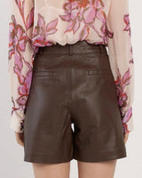 High-rise dark brown genuine leather shorts with a tailored fit and back pocket detailing.