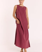 Wine-colored cotton-linen maxi dress with a round neckline, tank-style bodice, and side split hem.