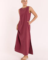 Wine-colored cotton-linen maxi dress with a round neckline, tank-style bodice, and side split hem.
