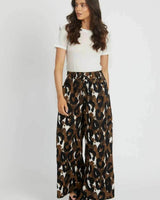 Ella wide-leg pants featuring a bold brown, black, and white animal print with a comfortable drawstring waist.