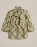 Green and cream plaid pussybow blouse with a relaxed fit, statement neck tie, and elasticated puff sleeves.