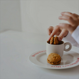 Fig and Salt Choccy Monte biscuits with chocolate filling and classic oatey texture in 200g packaging