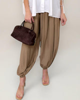 Caramel-colored Frankie balloon-fit pants in a soft rayon-nylon blend with gathered cuffs and a relaxed silhouette.