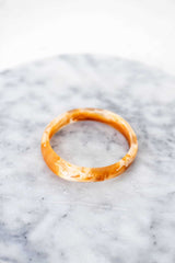 Greenwood Designs organic resin stacking bangles in assorted colors handcrafted for unique layered style