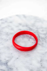 Greenwood Designs assorted organic resin stacking bangles in vibrant colors handcrafted for unique layered looks