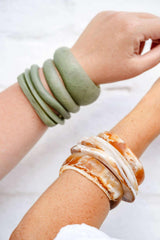 Greenwood Designs handmade resin stacking cuffs in assorted colors for stylish layering