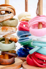 Greenwood Designs handmade resin stacking cuffs in assorted colors for unique layered style