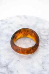 Greenwood Designs handmade resin stacking cuffs in assorted colors for unique layered style