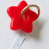 Greenwood Designs star resin keyrings in assorted bright, pastel, and neutral colors with silver and gold hardware