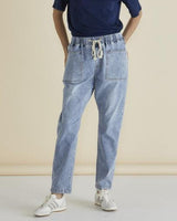 Light blue straight leg jeans with an elasticated drawstring waist, drop-crotch, and front patch pockets.