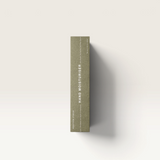 House of Holabox Addition Studio hand cream in a green 100ml aluminium tube with minimalist white typography