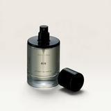 House of Holabox Solid State Aix Extrait de Parfum 50ml glass bottle with black cap on a reflective surface