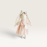 House of Holabox Alimrose Mini Sofia Bunny in a pink linen dress with a polka dot bow headband and small handbag